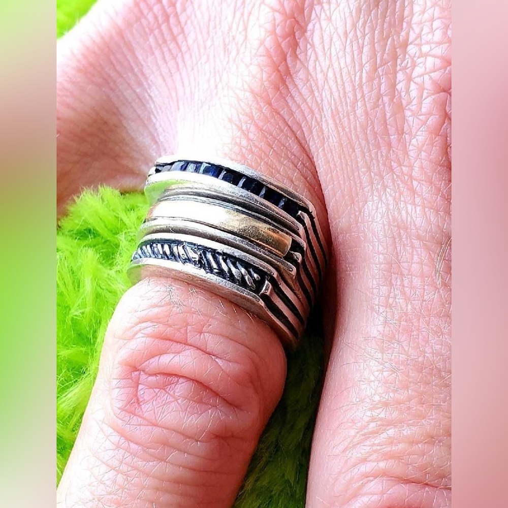 Cool 3 ring in 1, each ring different size, material unknown does not discolor